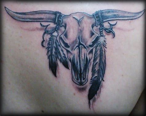 Bull Skull Tattoos With Feathers