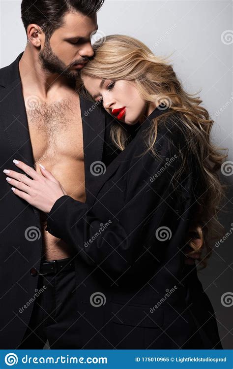Young Woman Touching Muscular Man On Stock Image Image Of Handsome