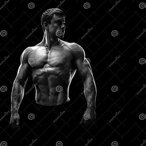 Stunning Muscular Young Men Bodybuilder Looking Behind Stock Image