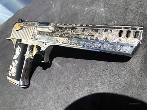 It has made a lot of appearances in films, computer games and popular culture for many years. GORGEOUS Engraved Desert Eagle 50 caliber 24k g... for sale
