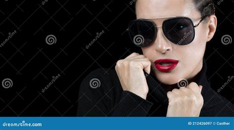 Beautiful Young Woman Wearing Black Turtle Neck And Sunglasses Stock