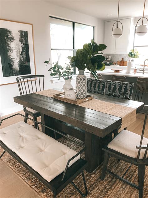 Use your imagination to pick up table covers, chairs, candles, drinks and food for your perfect dinner time with your beloved. West Elm Emmerson Dining Table - Dressed to Kill