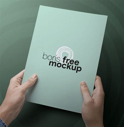 Free A4 Paper In Hands Psd Mockup Titanui