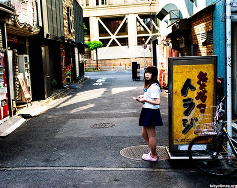 Japanese Schoolgirl Uniforms In Tokyos Kabukicho Red Light District