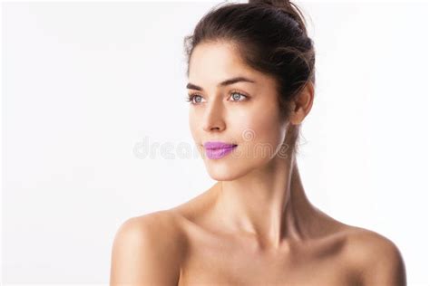 Beauty Shot Of Young Woman With Flawless Skin Wearing Purple Lipstick