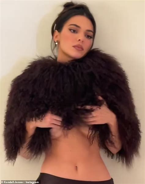 Kendall Jenner Flashes A Glimpse Of Underboob And Bare Taut Midriff In