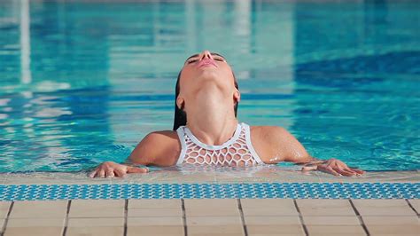 Stunning Woman Enjoying Swim In Pool Stock Footage Sbv