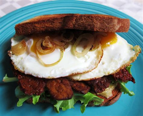 Garlic And Sea Salt Fried Egg And Tempeh Bacon Sandwich With Avocado