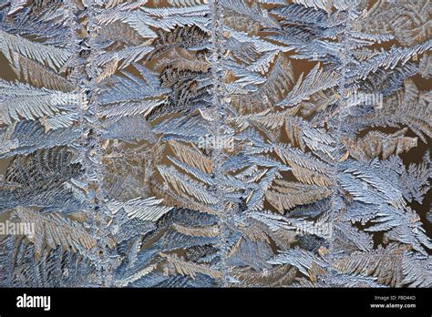 Beautiful Frost Patterns On Glass In Winter Stock Photo Alamy