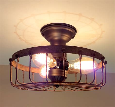 Tighten the screws with a screwdriver as needed to ensure the light fixture is secure and flush against the ceiling. Rustic Flush Mount Cage Ceiling Light | Rustic light ...