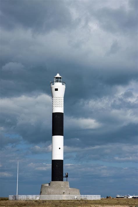Free Images Sea Coast Cloud Lighthouse Architecture Sky White