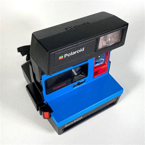 Polaroid Sun 600 With Upcycled Blue And Red Face Refreshed Cleaned