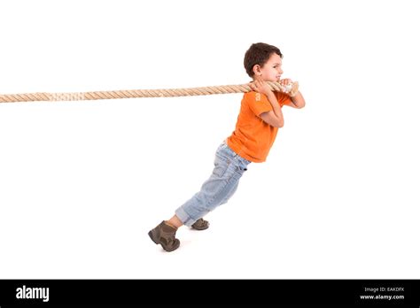 Boy Pulling Rope Isolated In Hi Res Stock Photography And Images Alamy