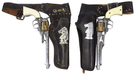 Toy Cap Guns And Holsters 2 Both Colt 45s Mfgd By Hubley 14l W2