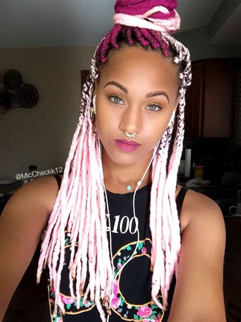 So if you've been wearing your hair naturally for some time and are on the lookout for a transformation, yarn braids are if the vibrant hues of yarn braids are not enough, jazz them up a bit more just like normal braids with beads and funky hair clips. Pink Yarn Braids - IG @MicCheckk12 #yarnbraids # ...