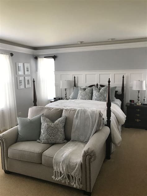 Equip this room so that it harmonizes not only with general ensemble of house, but also with inner world of owners. Wall color Hush by Behr. Bedding from Home Goods. Loveseat from Ashley Furniture. | Guest ...