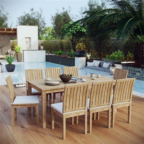 Teak has a high oil content that makes it resistant to rotting, bug infestation, and the effects of wind, rain, sun, and snow. 9 Piece Patio Teak Dining Set EEI-3315 - Patio Furniture Co