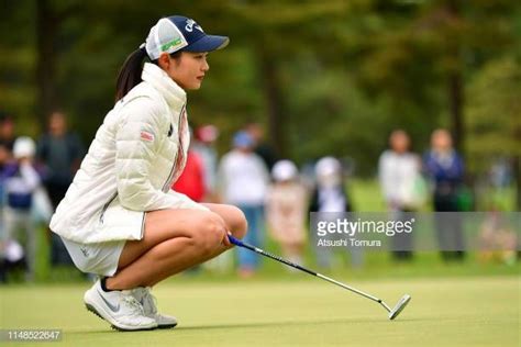 Momoka Miura Of Japan Lines Up For A Putt On The 2nd Green During The