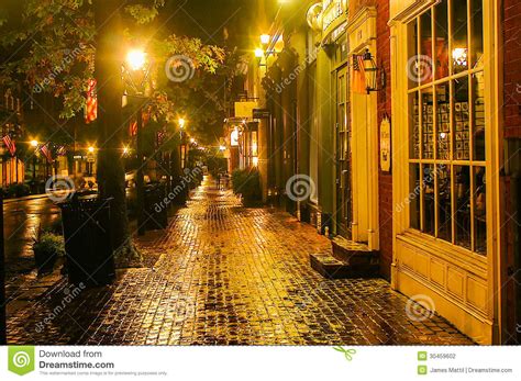 O`henry was blamed in theft and, although he wasn`t guilty, he was prisoned. Rainy Night in Old Town editorial photography. Image of ...