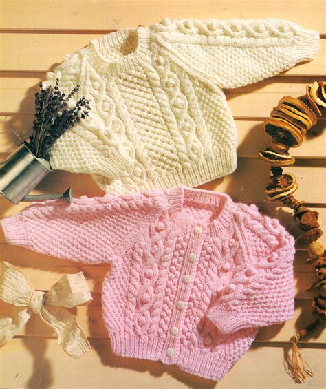 Baby Aran Raglan Sweater And Cardigan 16 22 0 3 Years Knitting