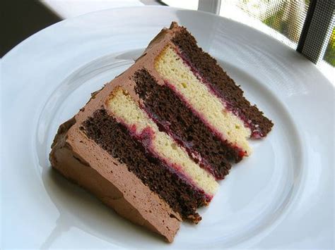In a medium bowl, beat mascarpone and powdered sugar until smooth and spread the chocolate frosting on the top and sides of the cake using an offset spatula. My Slice (Chocolate-Vanilla Layer Cake with Raspberry ...