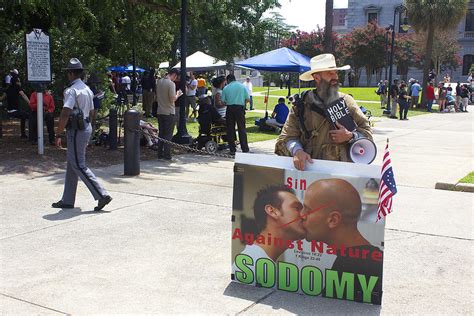 An Anti Gay Guy At An Anti Confederate Flag Rally Photograph By Joseph
