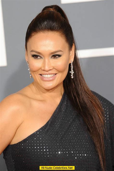 Tia Carrere Posing At 54th Annual Grammy Awards