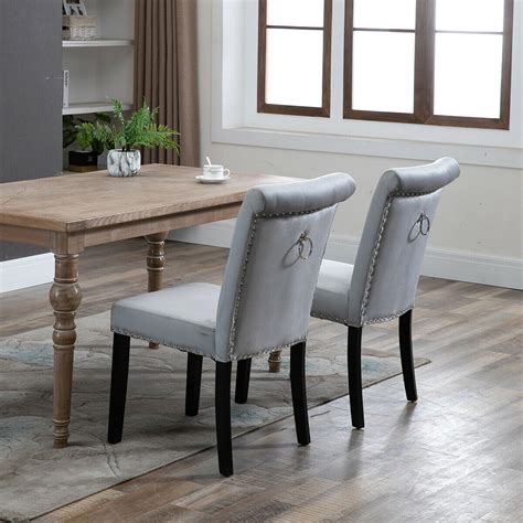Crafted with lush foam padding and a curved back enhanced with button detailing, these chairs are both sturdy and comfortable. 2x Velvet Dining Chair with Knocker/Ring Back Dining Room ...