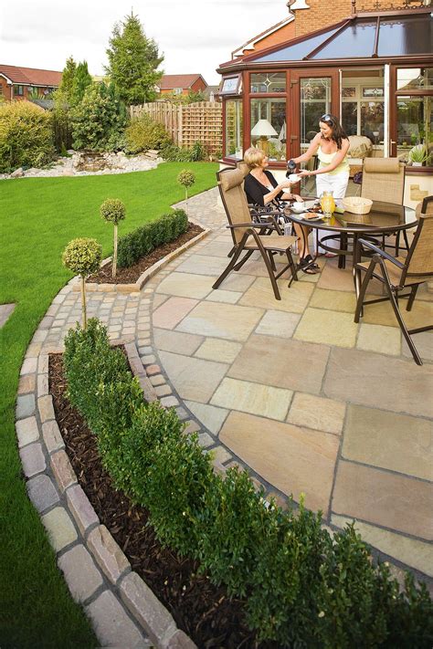 Curved Patio With Inset Planting Beds Landscaping Around Patio