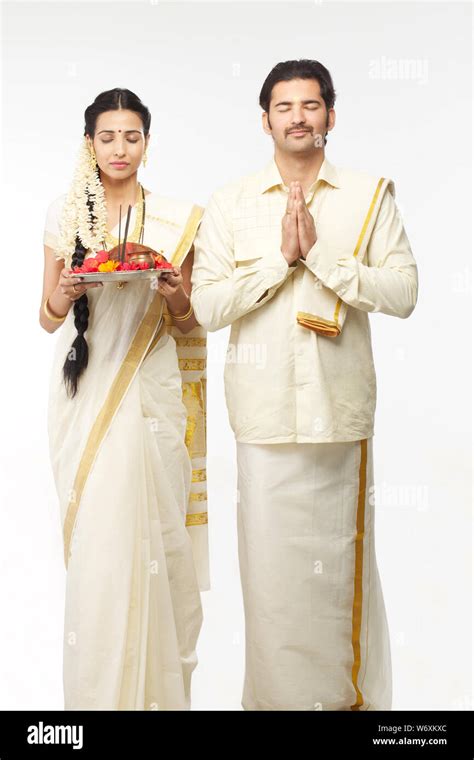 South Indian Couple Praying Stock Photo Alamy
