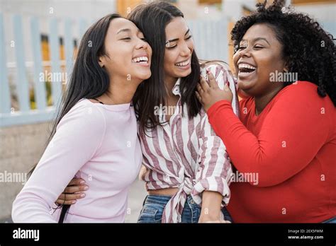 Happy Latin Girls Enjoy Time Together Outdoor Around City Friendship And Diverse Ethnicity