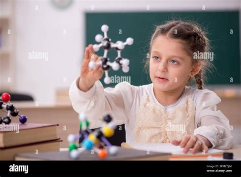 Little Girl Studying In The Classroom Stock Photo Alamy