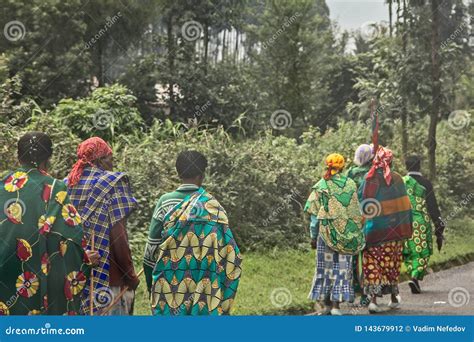 Group Of Rural Rwandan Women In Colorful Traditionals Clothes Walking