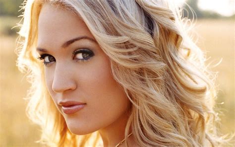 Download Pretty Blonde Woman With Curly Hair Wallpaper