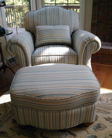 Leather chairs are elegant, comfortable and expensive. Club chair reupholstered in a stripe fabric with matching ...
