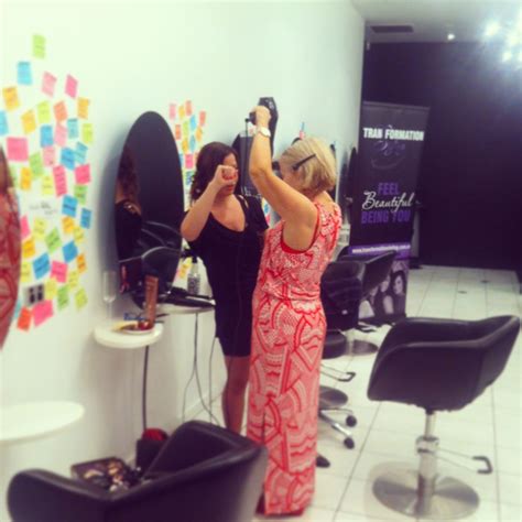 Louise conquering blowdrying skills at our Transformation Styling Hair