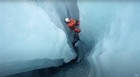 Incredible Footage Of And Ice Climber Exploring An Epic Ice Cave In The