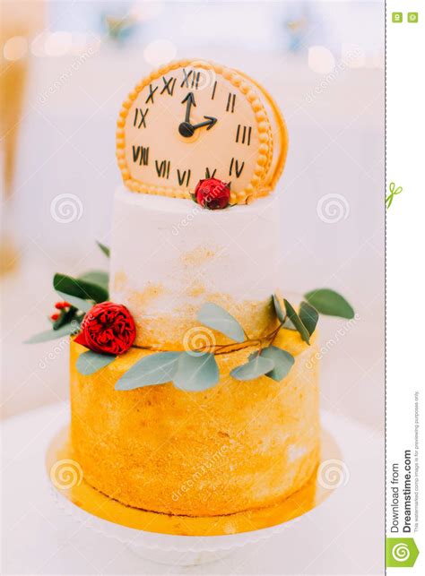 Wedding Cake Decorated With Clocks And Flowers Close Up Stock Image