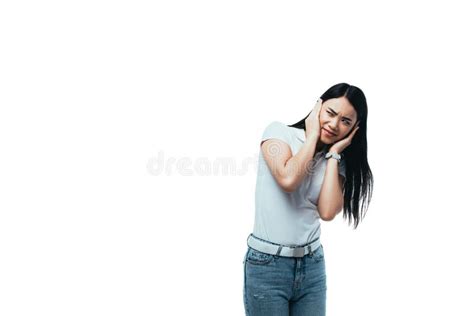 Attractive Asian Girl Covering Ears With Hands Isolated On White Stock