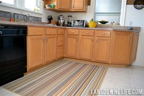 The runner rug measures in at 48 x 17.7 inches and the second rug measures in at 27.5 x 17.7 inches. Big rug in the kitchen - Lansdowne Life