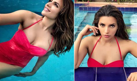 shama sikander flaunts her cleavage in red bikini sets the temperature soaring at a pool with