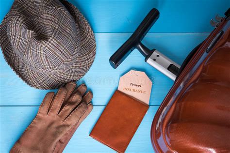 We're your partner in a constantly. Travel Insurance Concept. Suitcase, Hat, Gloves, Passport Case, Insurance Tag. Insurance Tag ...