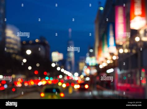 Blurred Night Lights Of Manhattan Street Scene Near Chelsea Piers In
