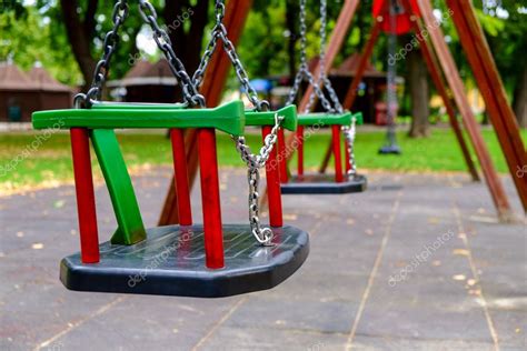 Empty Swings On Playground — Stock Photo © Kavita 84733146