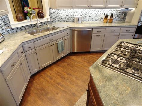 Yep, we had to ensure there were joists installed on the edges of the floor. Cool vinyl wood plank flooring in Kitchen Beach Style with ...