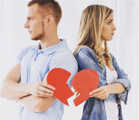 Frustrated Young Couple Holding Broken Heart Stock Photo Image Of