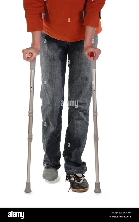 Person With Crutches Stock Photo Alamy