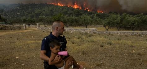 fires in greece rage west of athens on rhodes