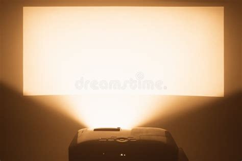 Projector In Action With Illuminated Screen Stock Image Image Of Haze