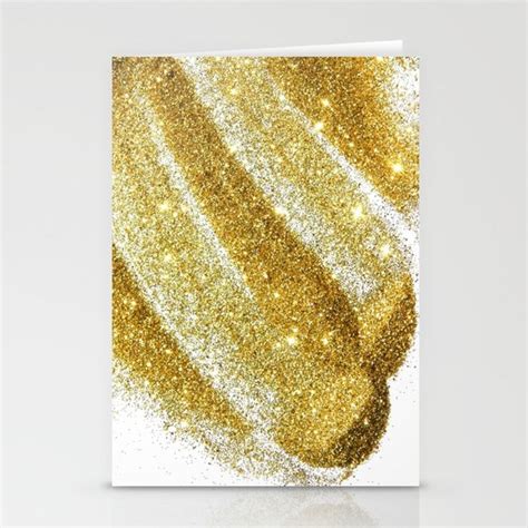 A Card With Gold Glitter On It